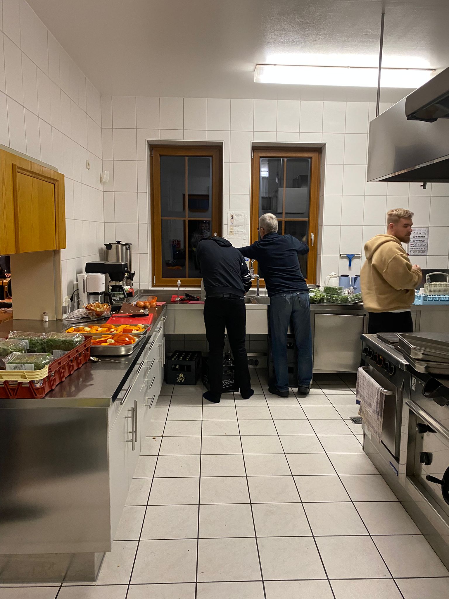 Participants cooking together in the kitchen